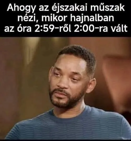 Ahogy az éjszakai műszak nézi, mikor hajnalban az óra 2:59-ről 2:00-ra vált Ahogy az éjszakai műszak nézi, mikor hajnalban az óra 2:59-ről 2:00-ra vált